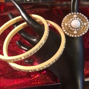 Two bangles and ring.